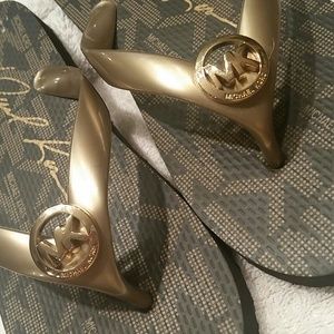 Michael Kors flip flops. Size 7.